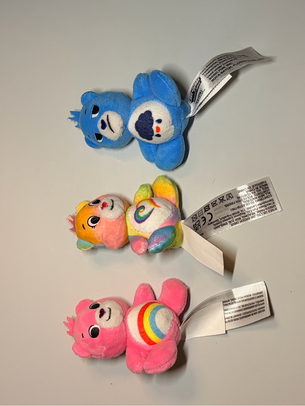Care Bears Mini Plush Keychain Trio - Blue, Rainbow, Pink
